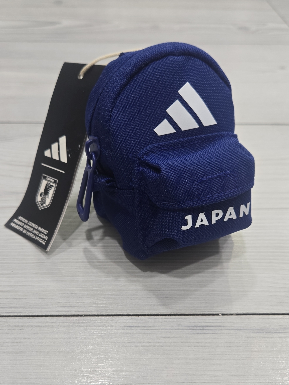adidas navy blue mini backpack keychain with white logo